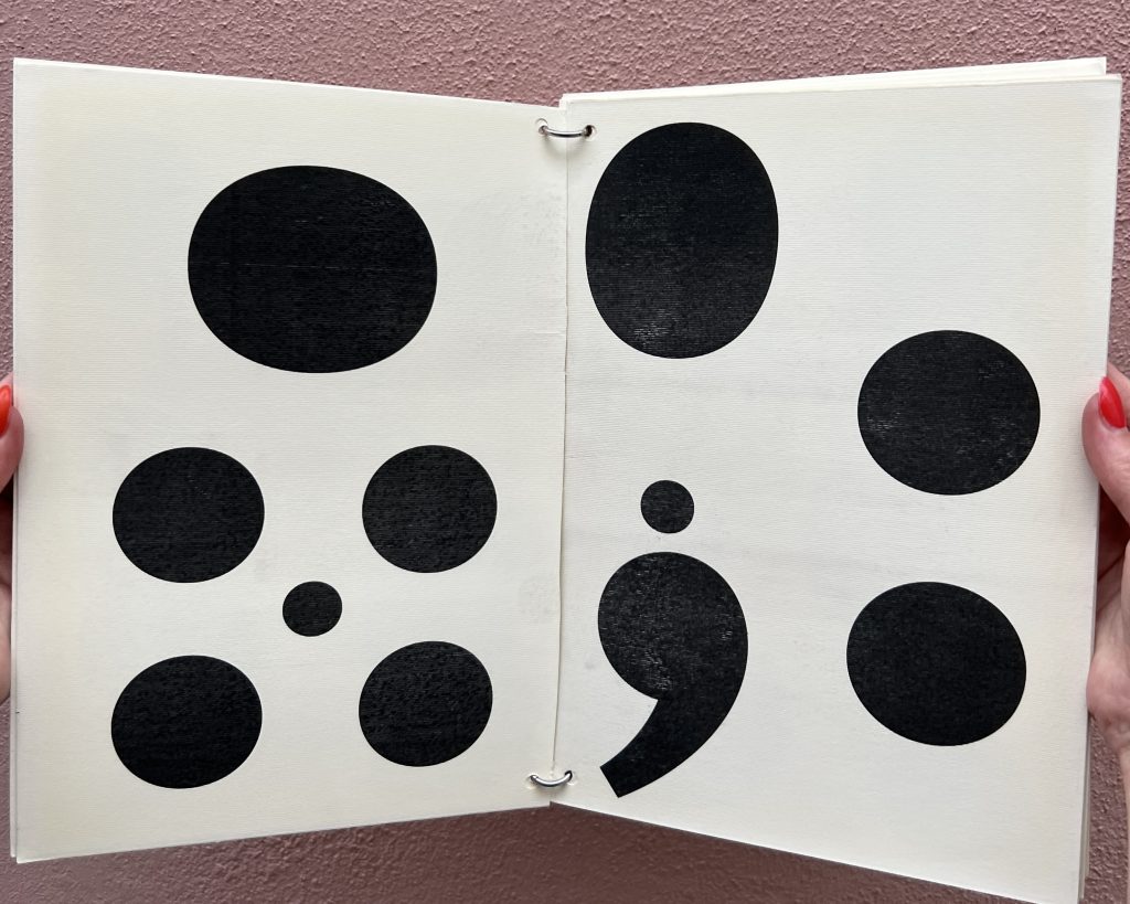 Open spread of a black and white booklet