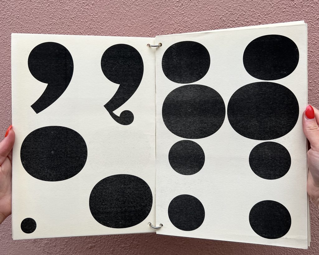 Open spread of a black and white booklet