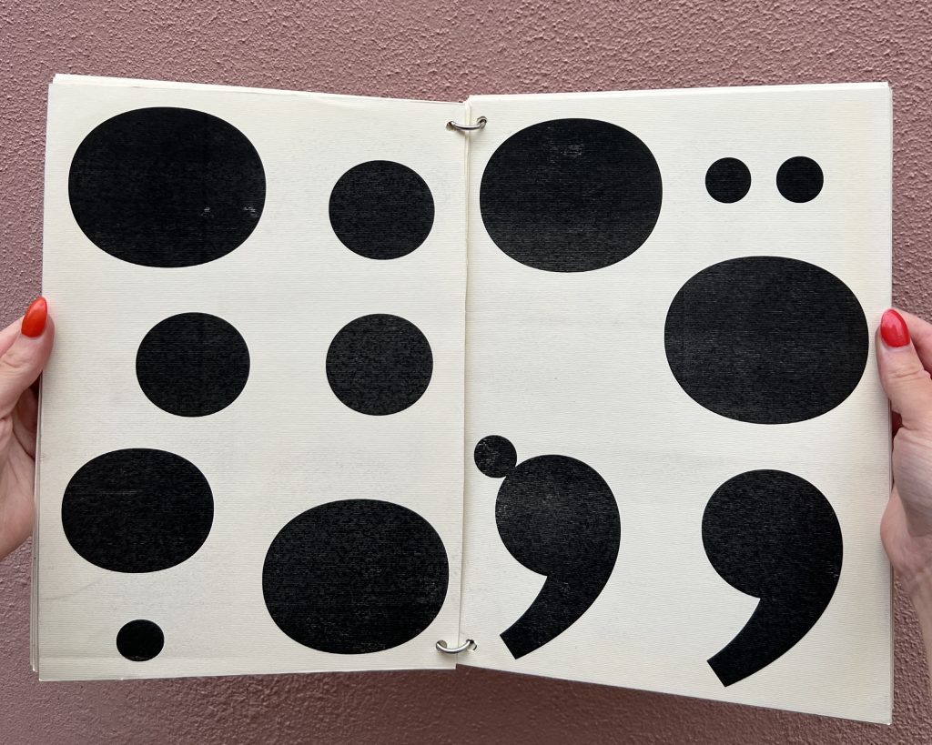 Open spread of a black and white booklet