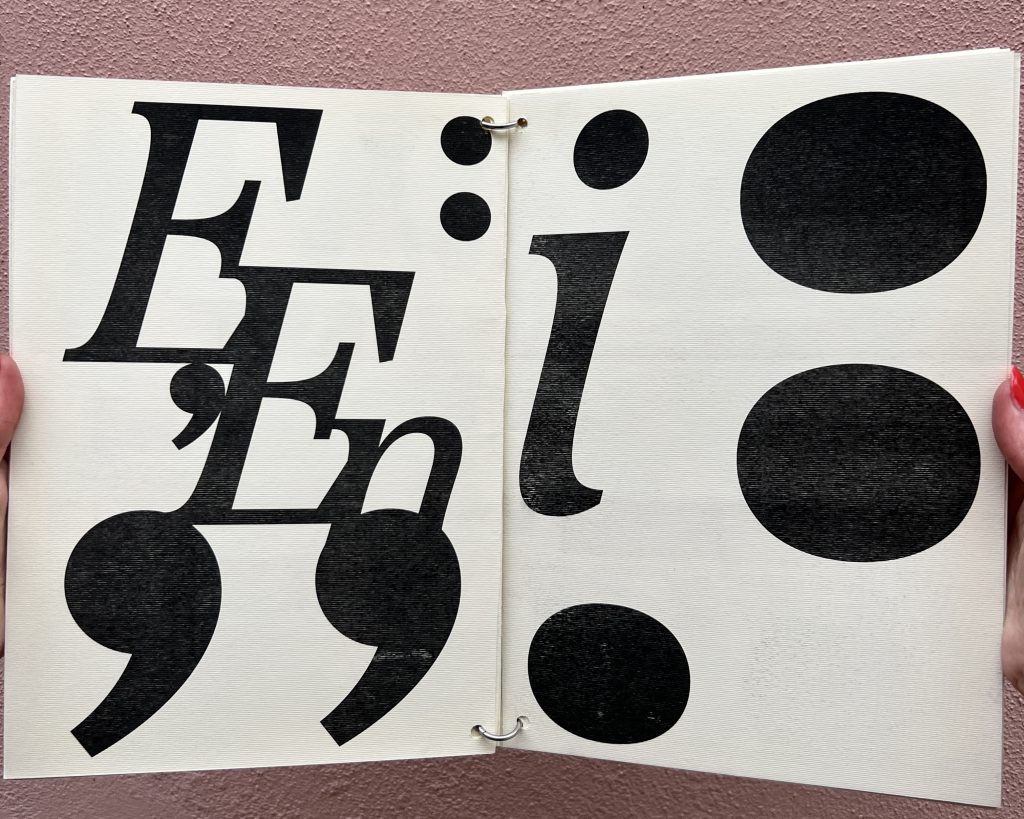 Open spread of a black and white booklet