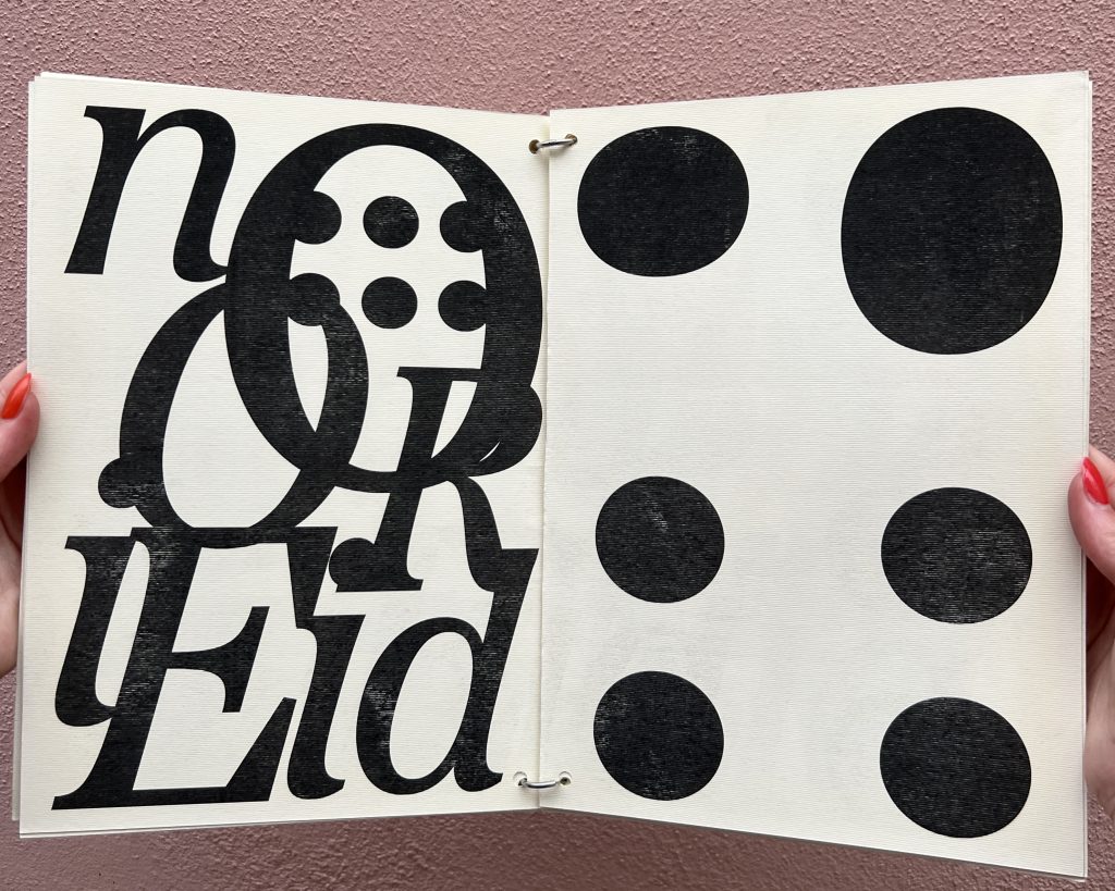 Open spread of a black and white booklet