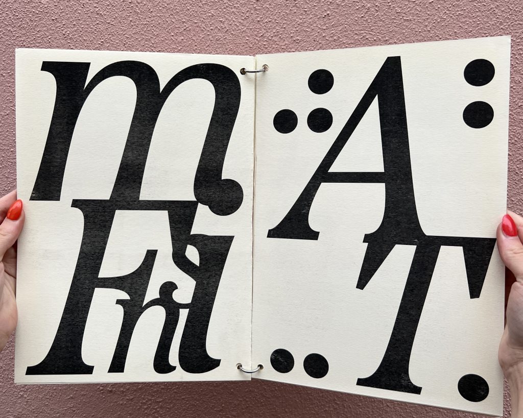 Open spread of a black and white booklet