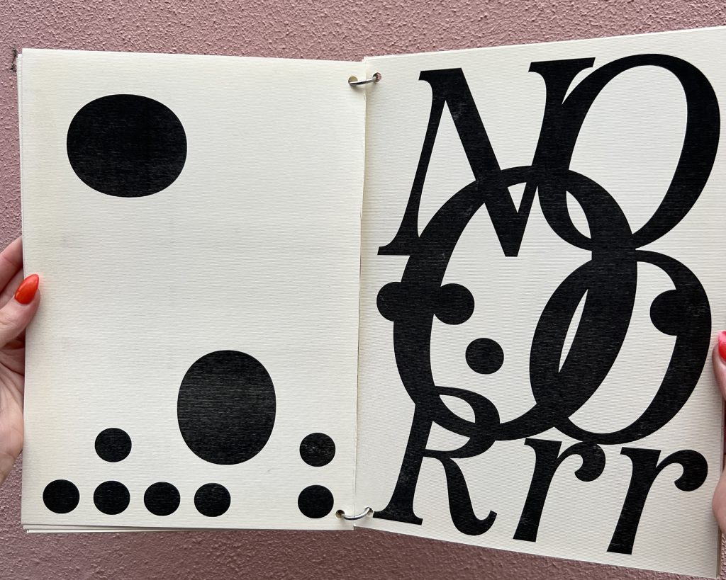 Open spread of a black and white booklet