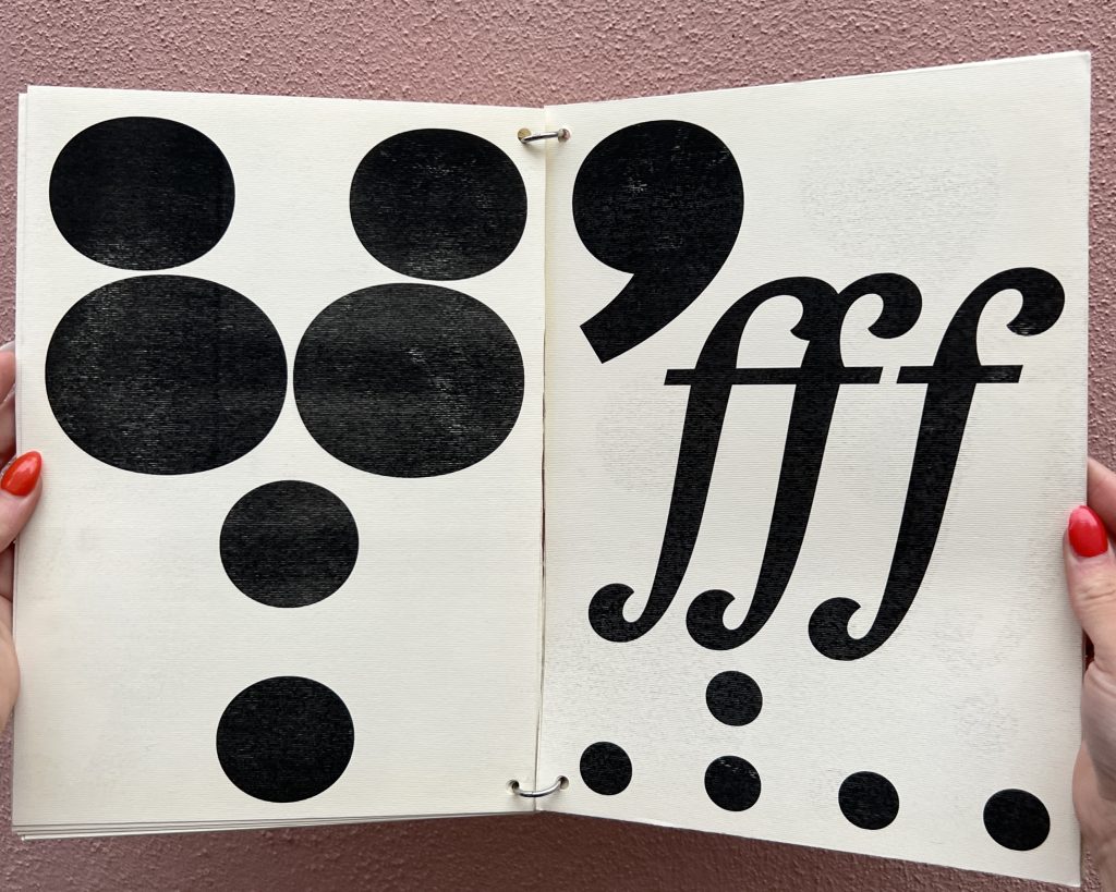 Open spread of a black and white booklet