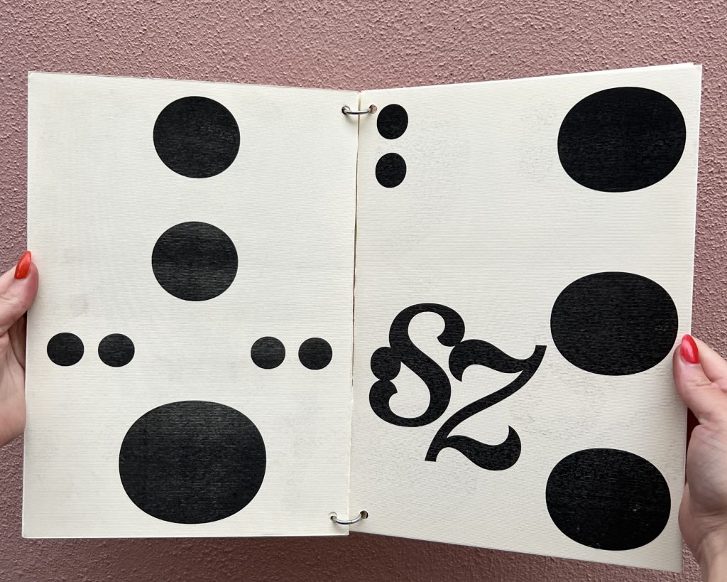 Open spread of a black and white booklet