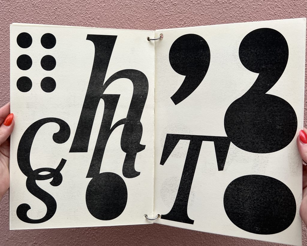 Open spread of a black and white booklet