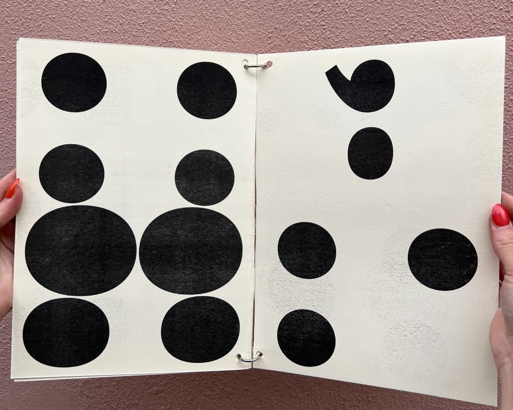 Open spread of a black and white booklet