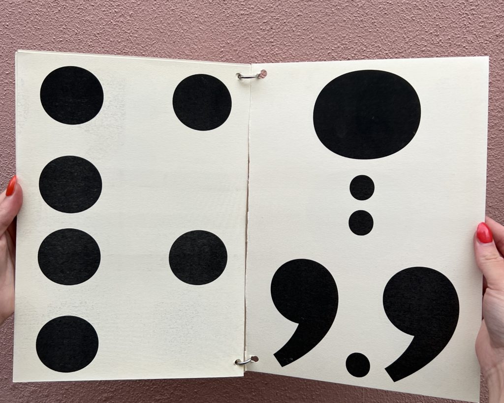 Open spread of a black and white booklet